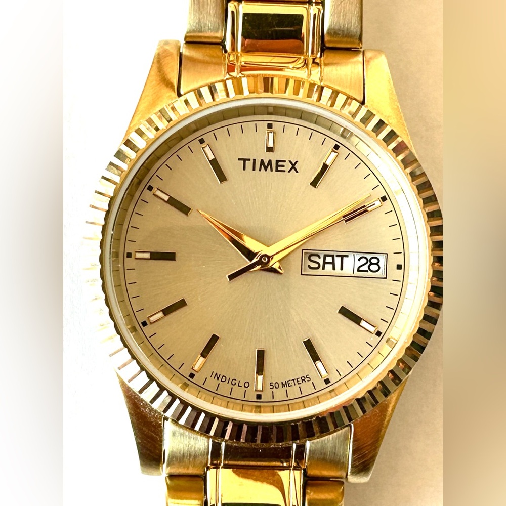 Timex T2M557 Gold-Tone Watch with Day-Date Feature Unisex